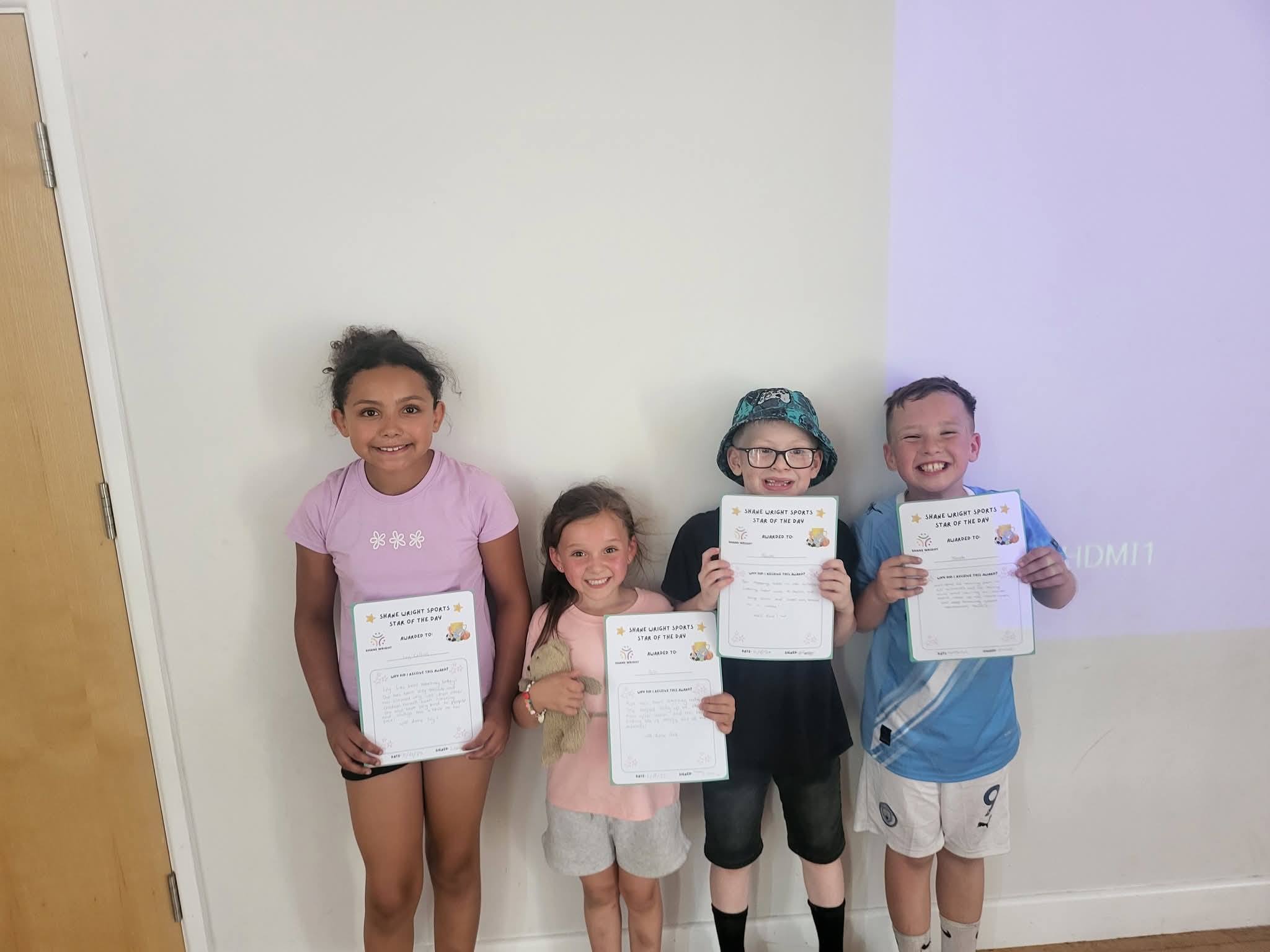 Children celebrating at a Next Move Sport birthday party